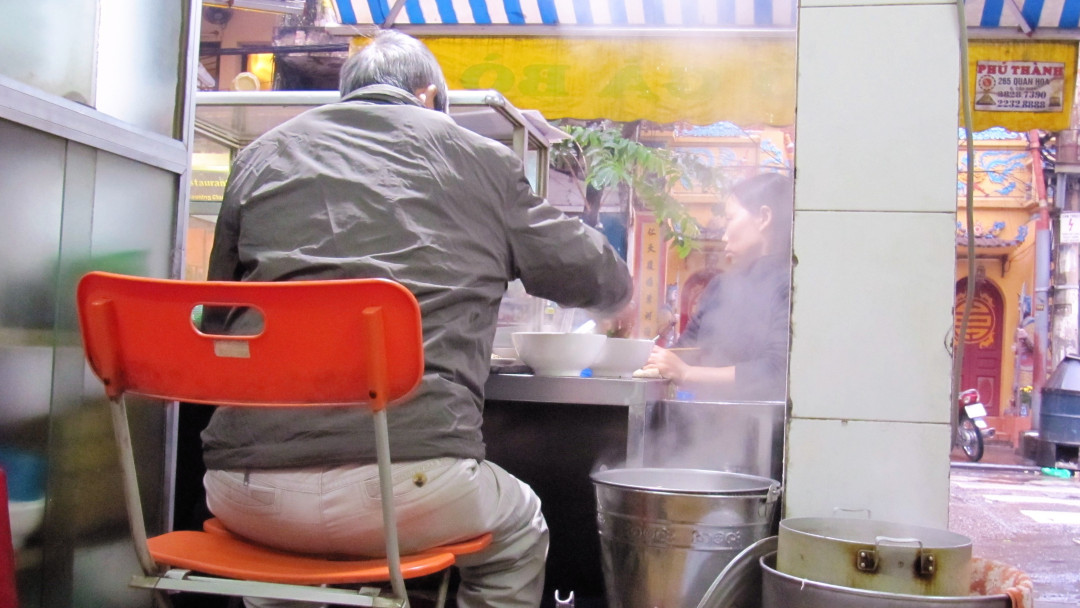 Another customer and another bowl of pho gets ready to be served