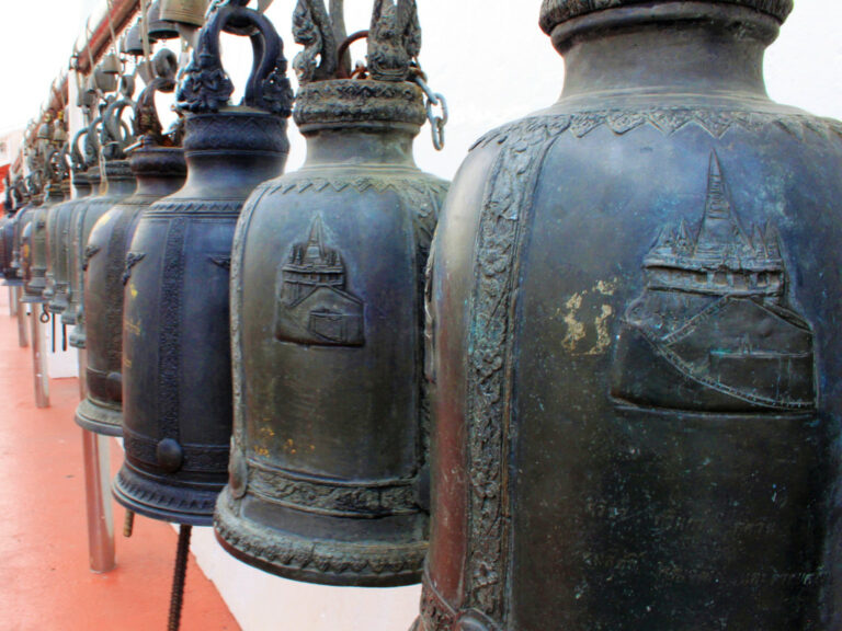 Many bells lined against the wall at the Golden Mount
