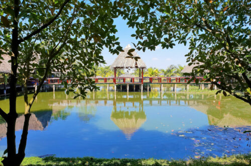 View of thatched hut on a pond at restaurant in Mekong Delta