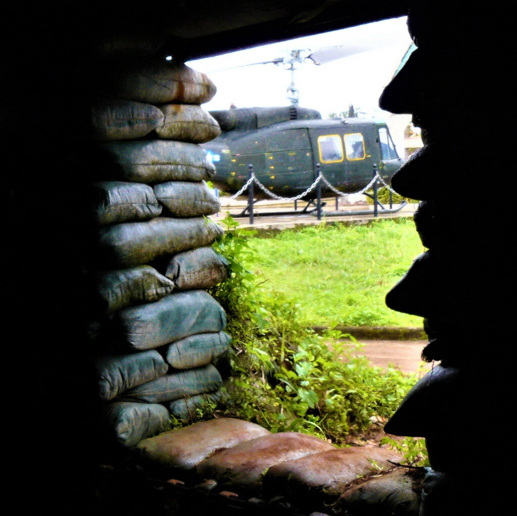 View of the museum with a helicopter from inside a bunker at Khe Sanh Combat Base