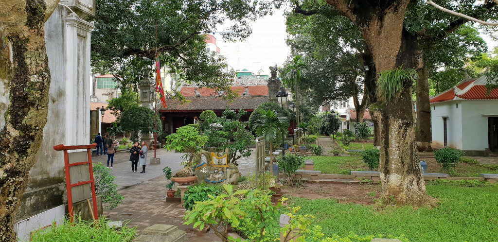 View of the courtyard within Quan Thanh temple with the shrine ahead