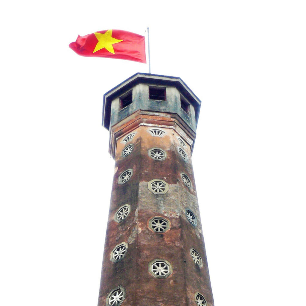 Flag tower at Vietnam Military Museum with flag fluttering