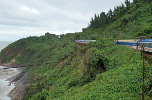 Reunfication Express train on its way to Danang which you can see in the background