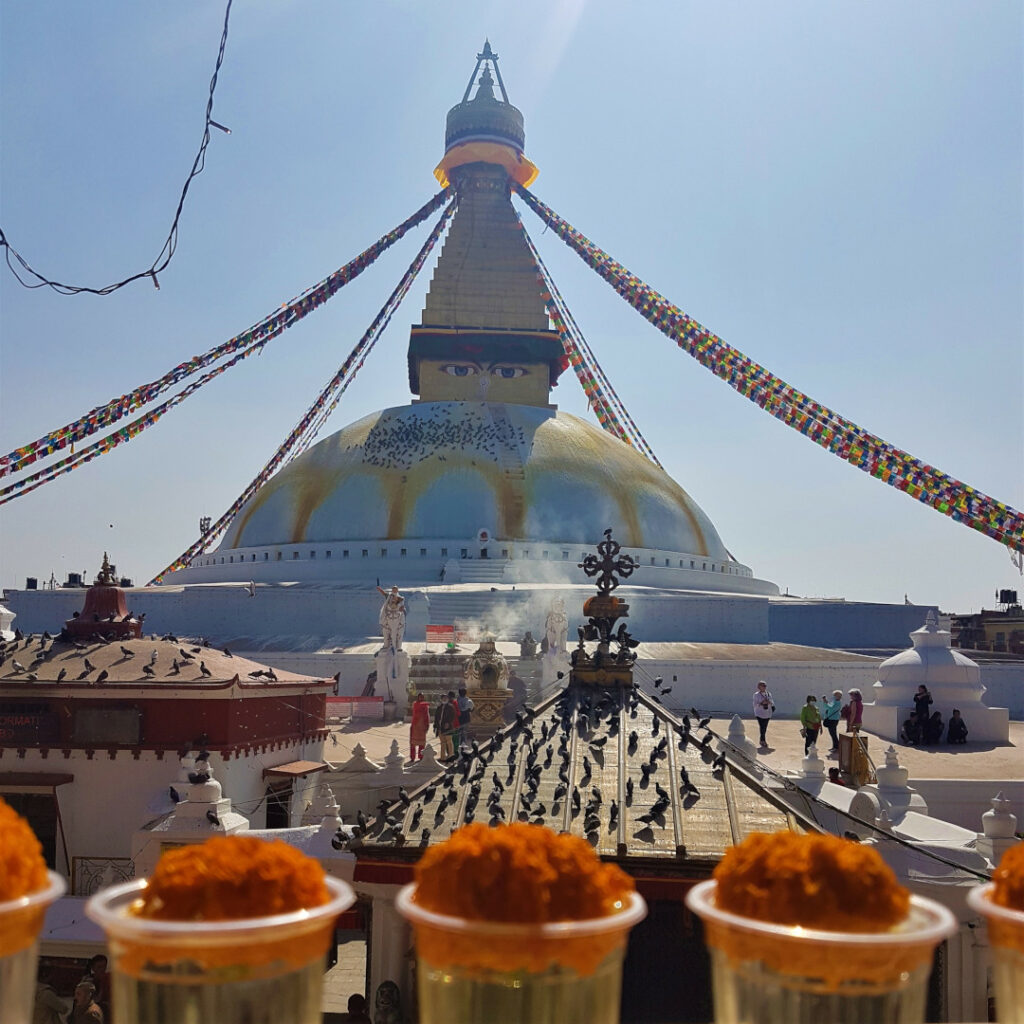 The Boudhanath Stupa with butter lamps in the foreground