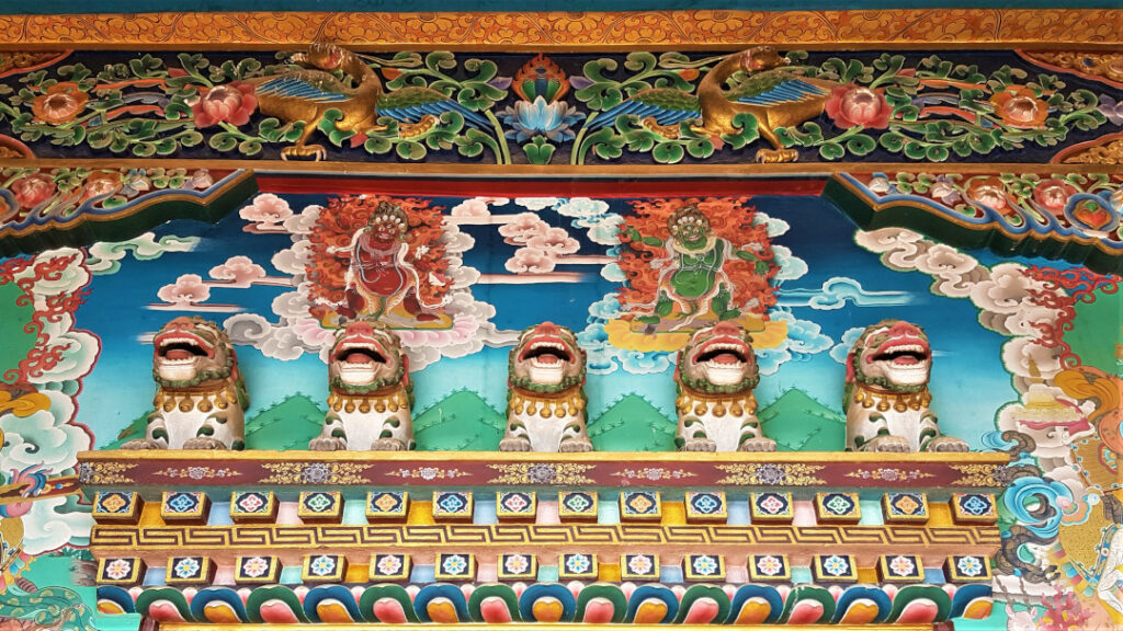 Engravings and murals at Lhakhang Monastery