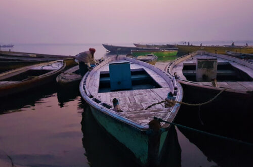 A boatman gets his boat ready for the day
