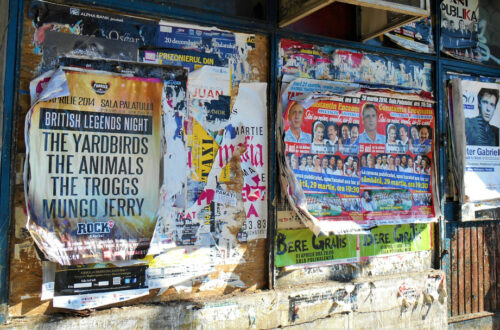 Posters on the wall on Schitu Magureanu street