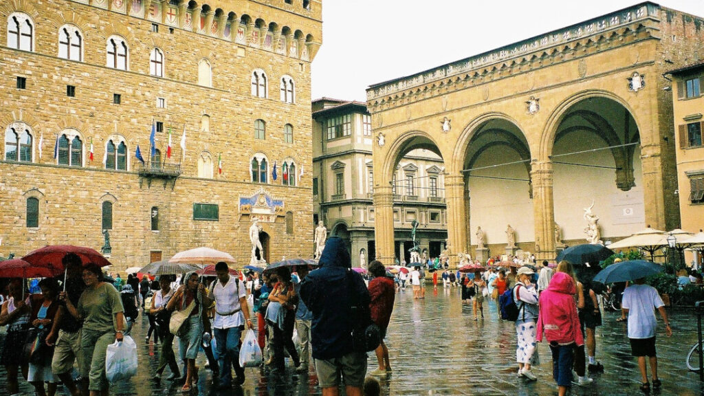 The piazza with Loggia dei Lanzi in the background