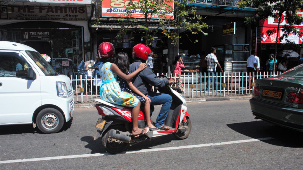 Triple ride is common across Asia