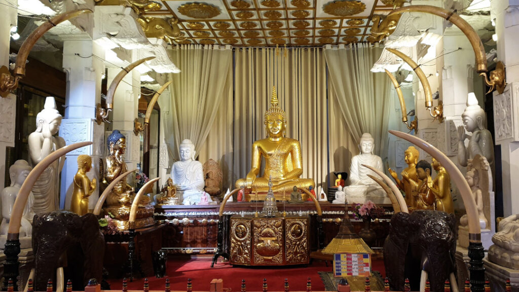 The statue of Buddha with ivory as adornments