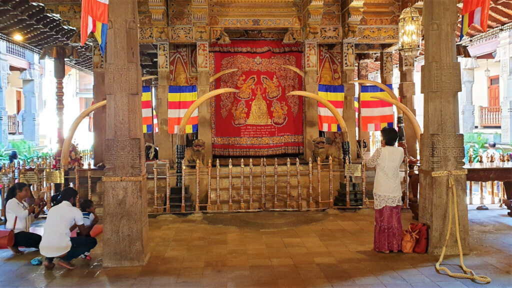 Devotees praying at the main shrine