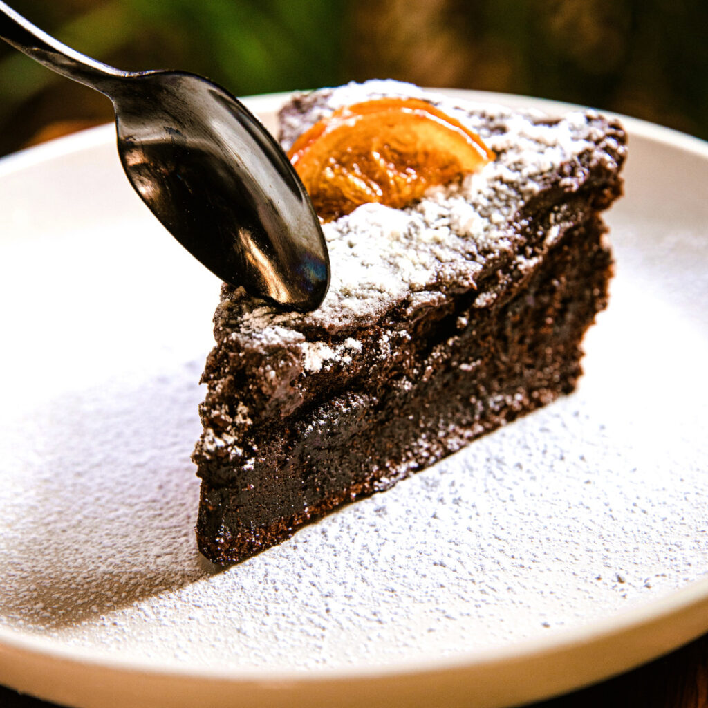 – a decadently rich cake, with flavors of hazelnut and orange.