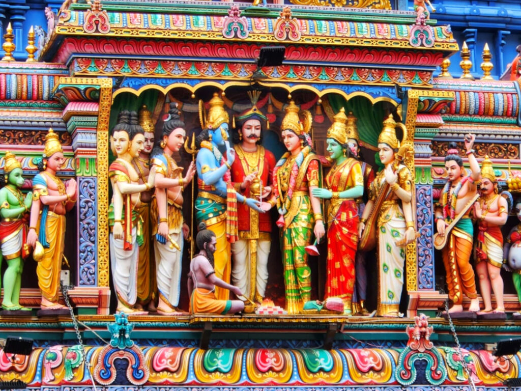A close-up of the intricate carvings on the exterior façade of the temple.