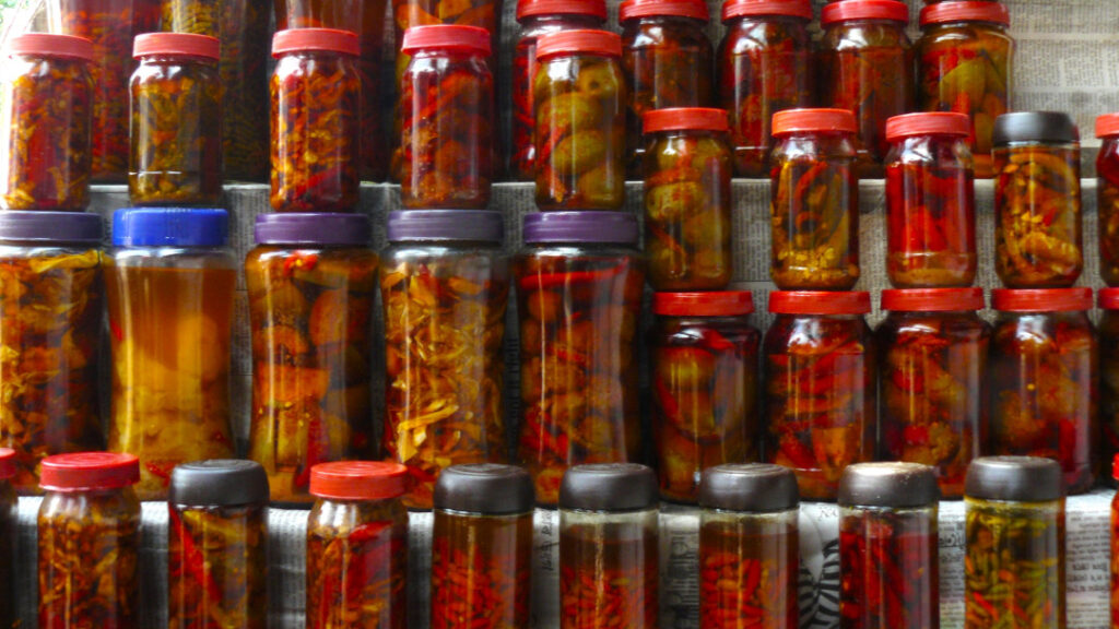 These chili pickles makes for a perfect accompaniment to a simple meal of dal, vegetables, and rice.